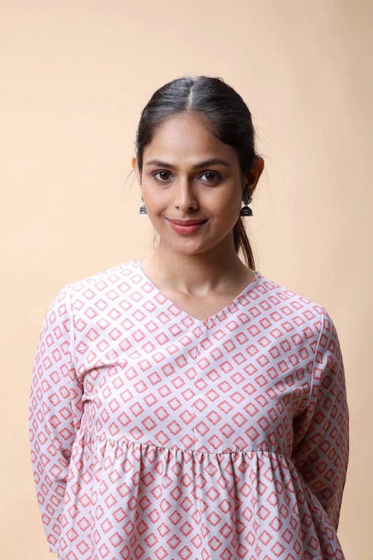 Shop Pink Ikkat Print Peplum Short Kurti For Women online at allthere.in