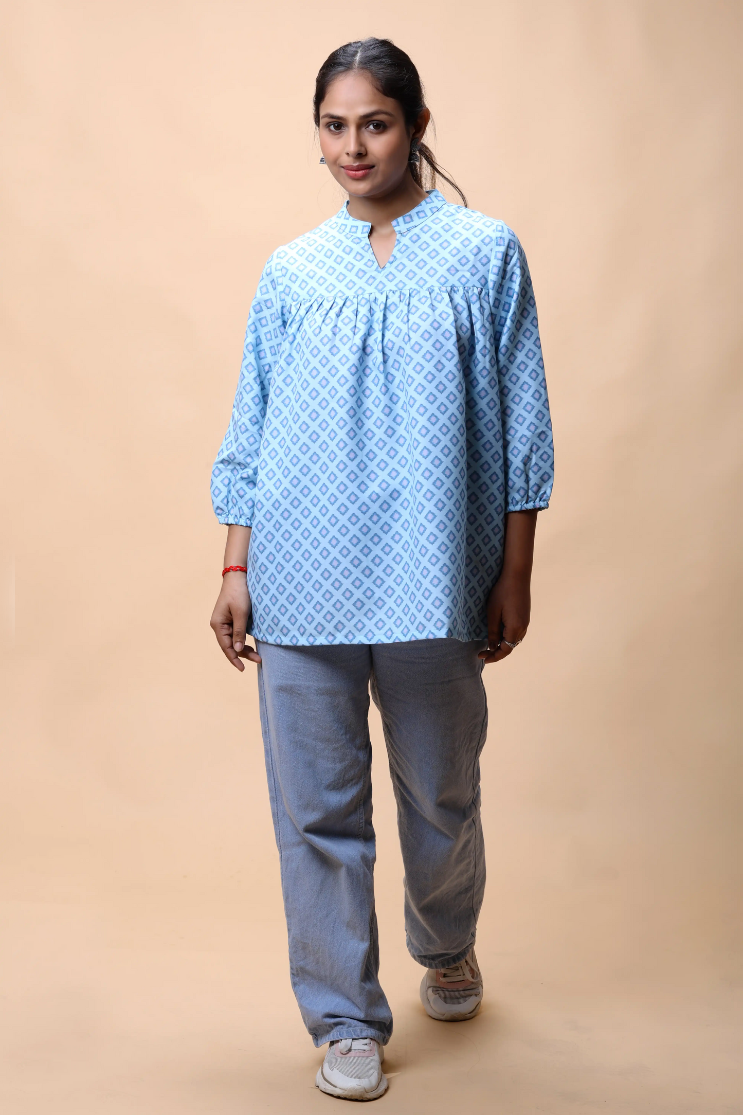 Shop Aqua Blue Empire Line Printed Short Kurti For Women online at allthere.in