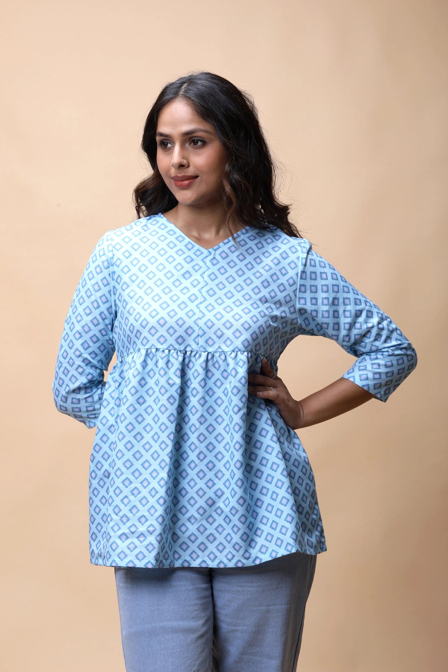 Shop Aqua Blue Ikkat Print Peplum Short Kurti For Women online at allthere.in