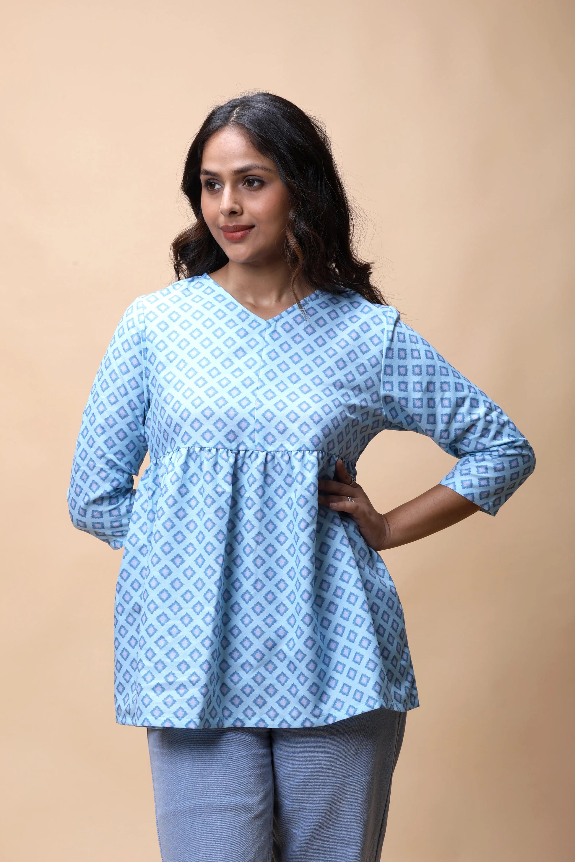 Shop Aqua Blue Ikkat Print Peplum Short Kurti For Women online at allthere.in