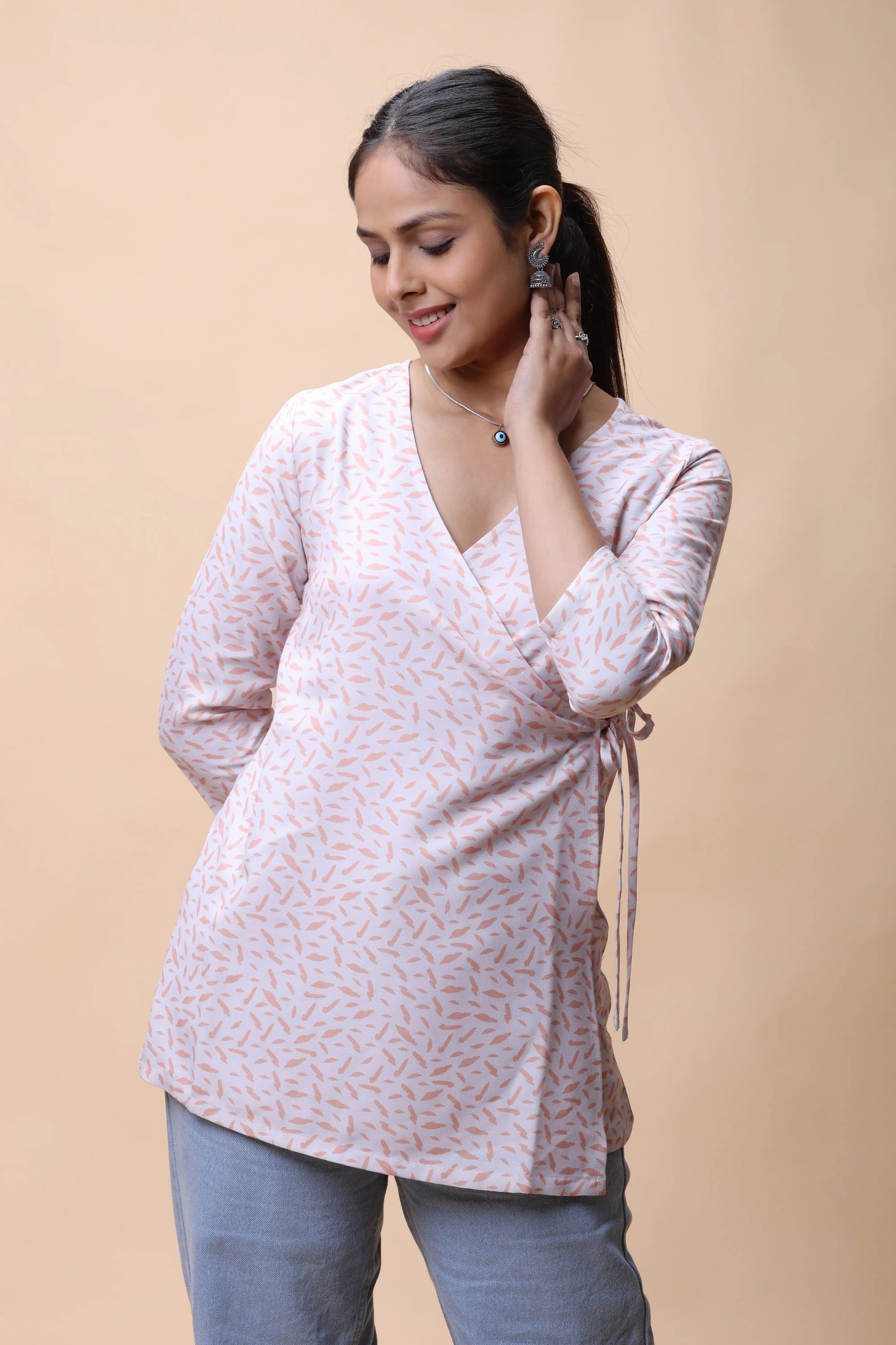 Shop All There Peach Wrap Around Printed Short Kurti For Women at allthere.in