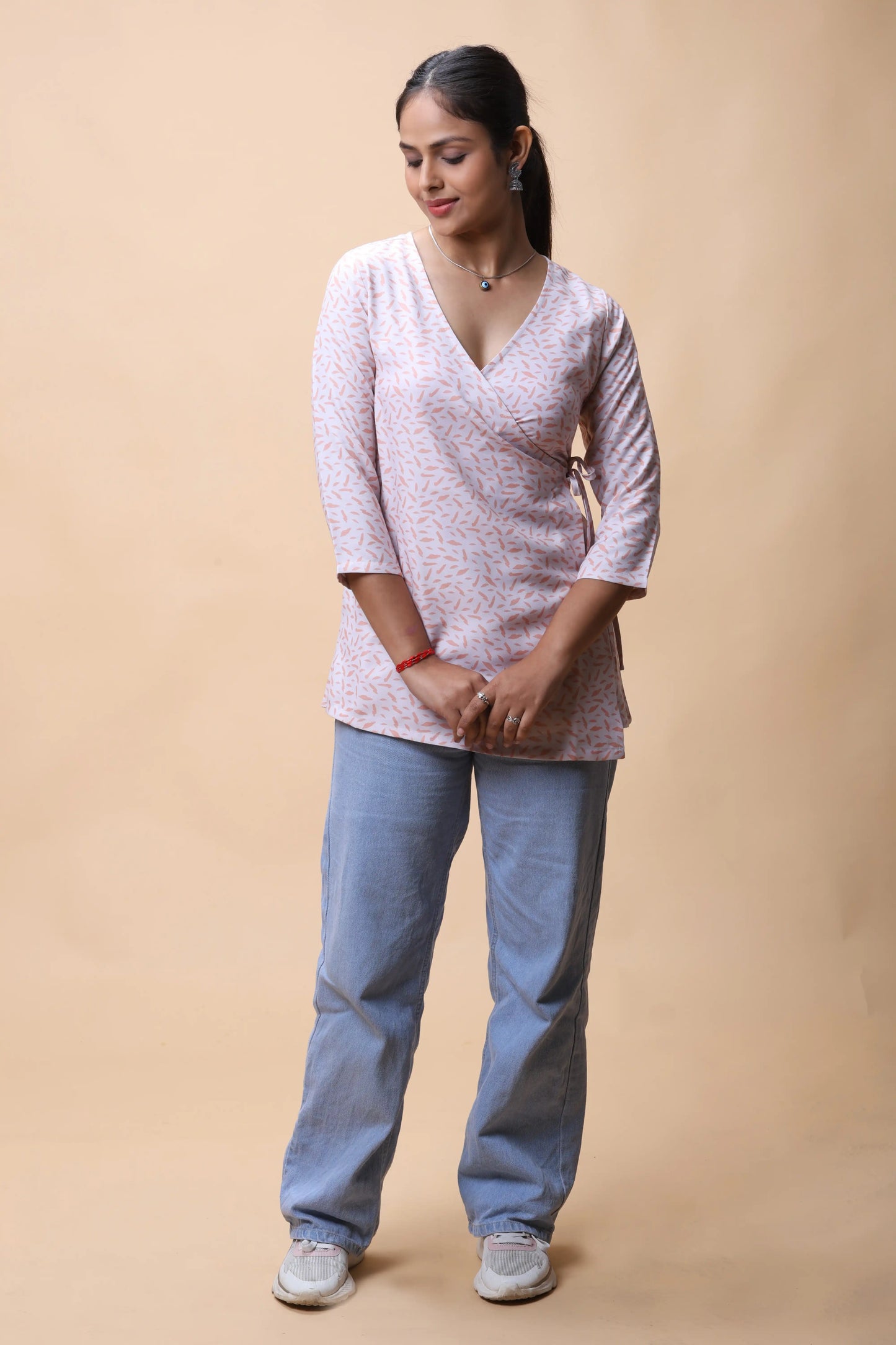 Shop All There Peach Wrap Around Printed Short Kurti For Women at allthere.in