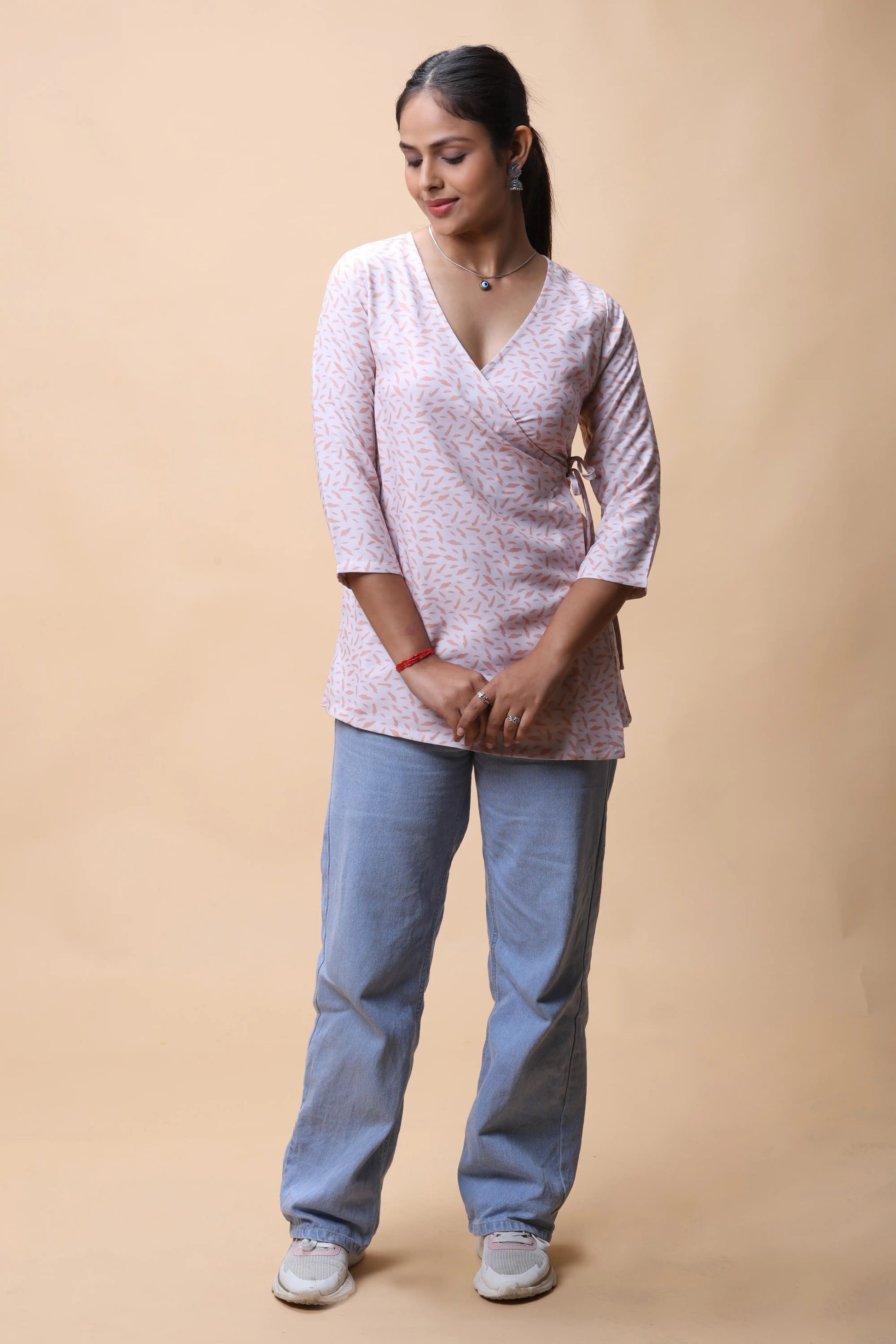 Shop All There Peach Wrap Around Printed Short Kurti For Women at allthere.in