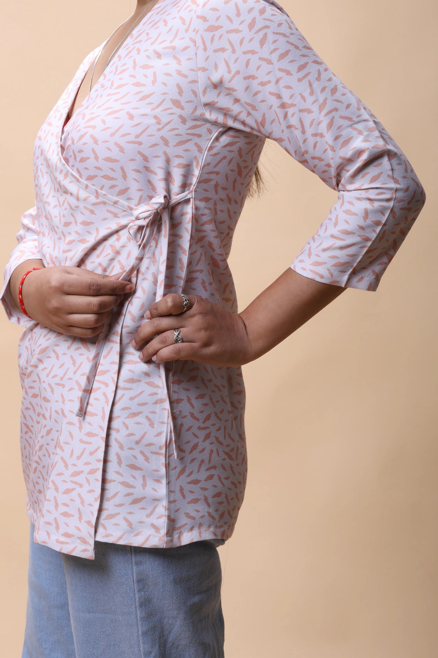 Shop All There Peach Wrap Around Printed Short Kurti For Women at allthere.in