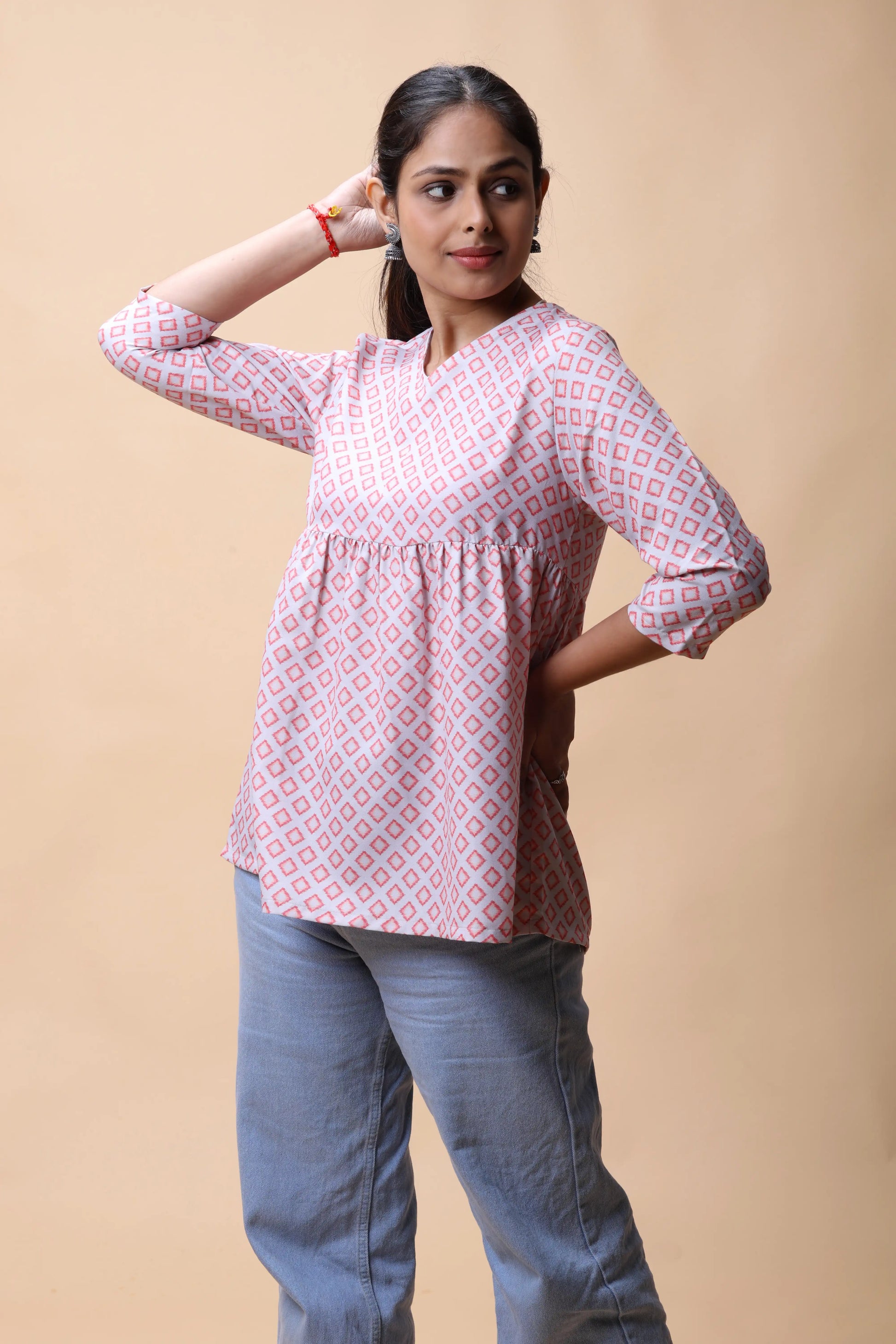 Shop Pink Ikkat Print Peplum Short Kurti For Women online at allthere.in