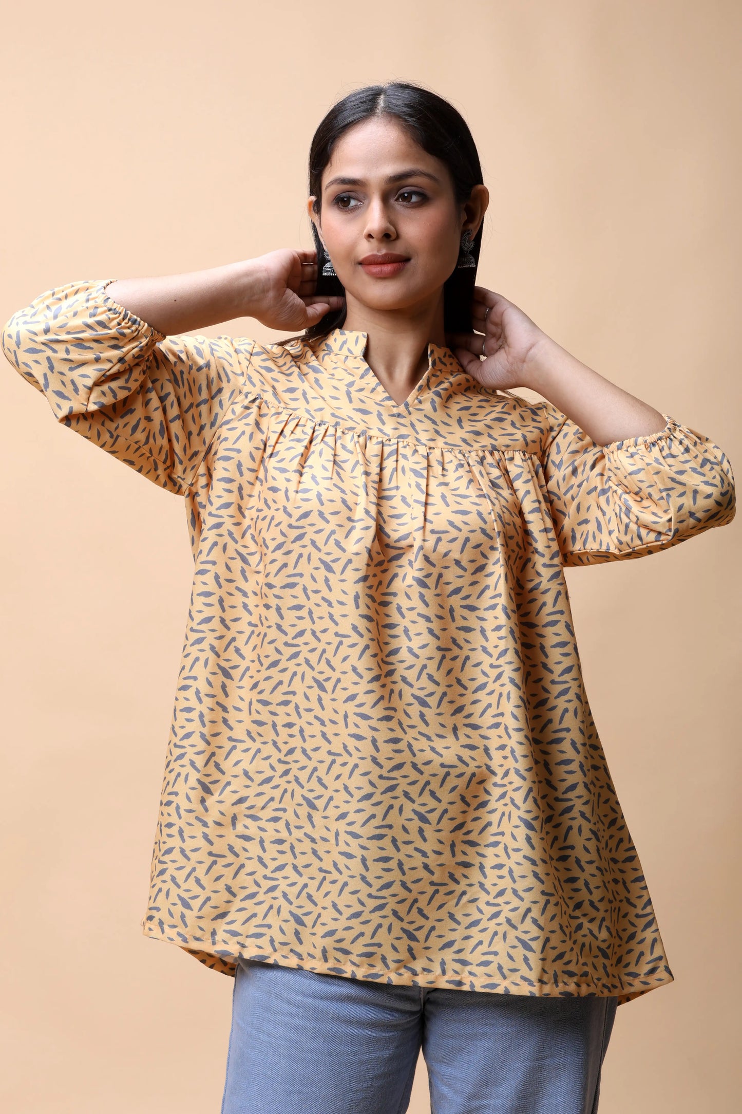 Buy Yellow Empire Line Printed Short Kurti For Women online at allthere.in