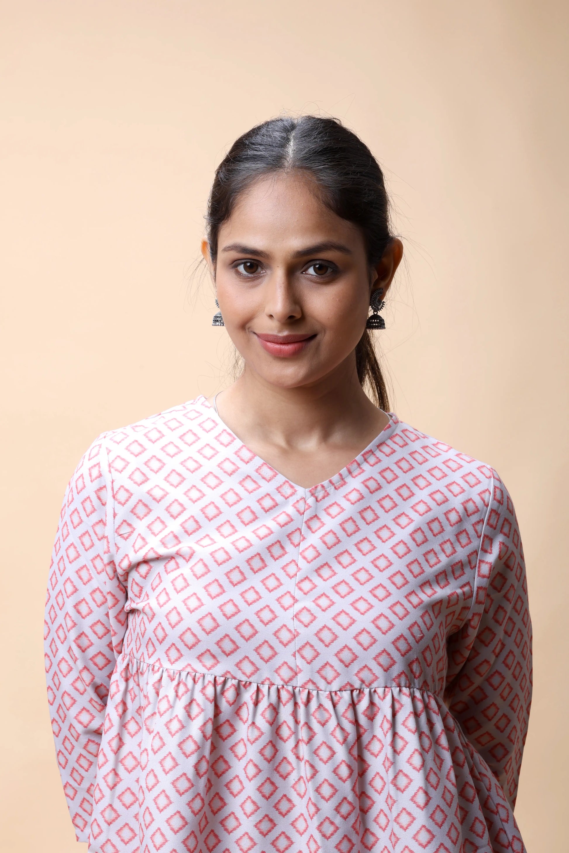 Shop Pink Ikkat Print Peplum Short Kurti For Women online at allthere.in