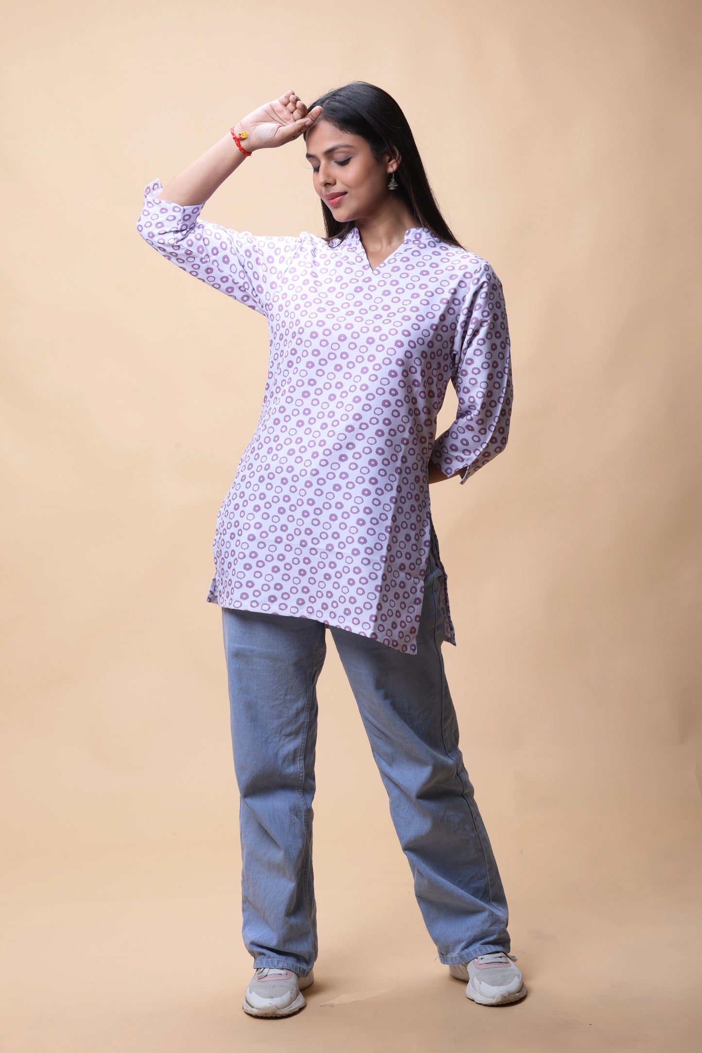 Trendy Purple Short Kurti Styled with Jeans for a Casual Look