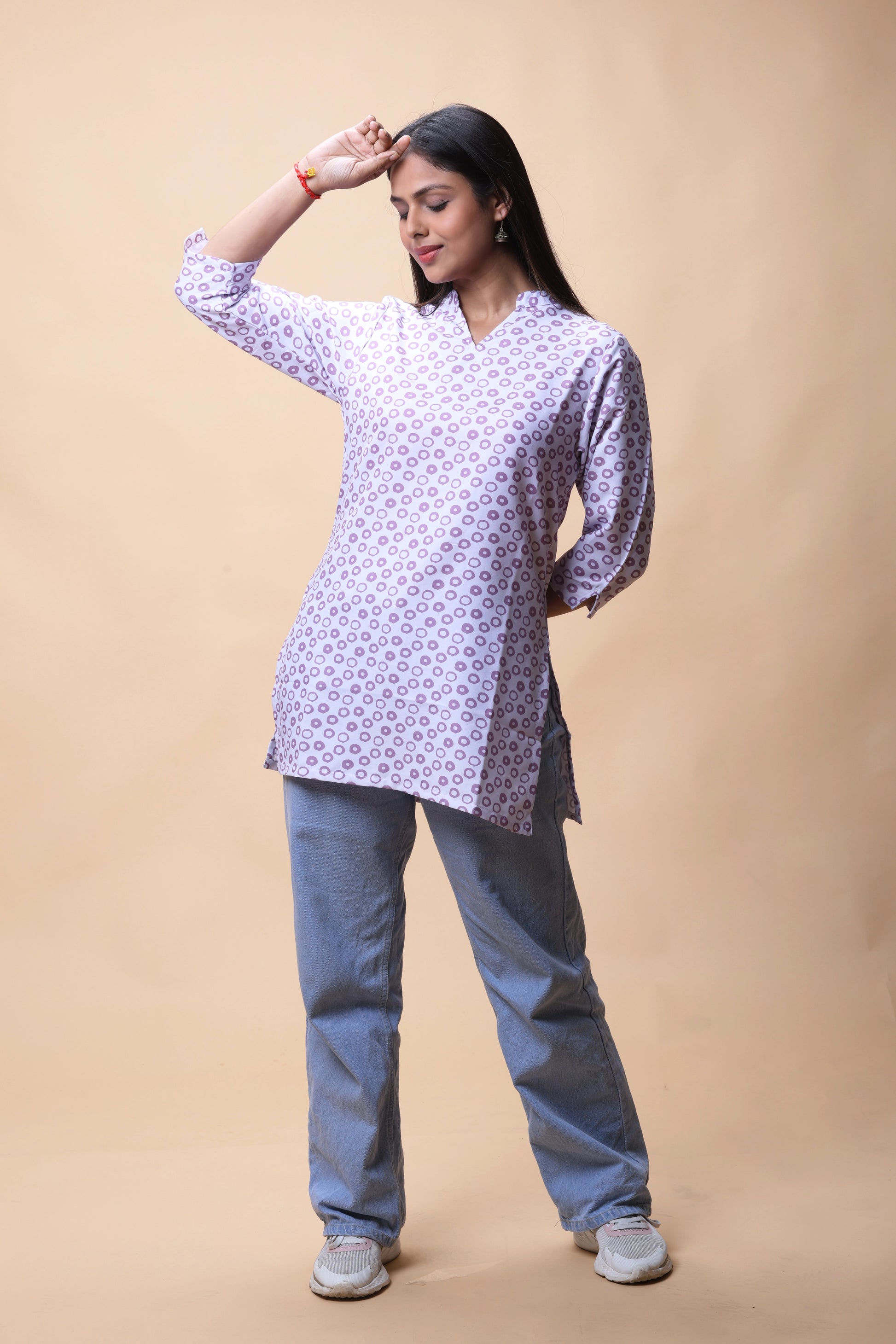Trendy Purple Short Kurti Styled with Jeans for a Casual Look